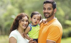 Youth family (mother, father, child) of South Asian appearance